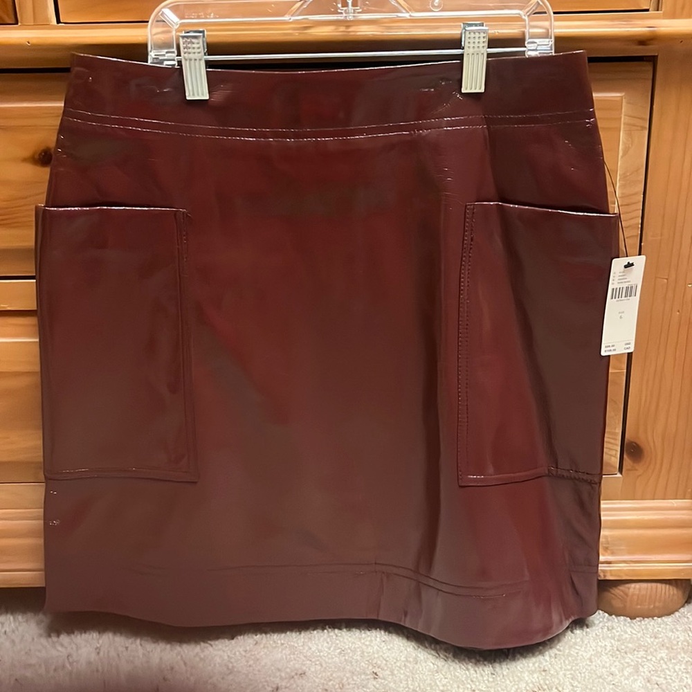 The most adorable burgundy leather skirt with pockets. Maeve by Anthropologie.